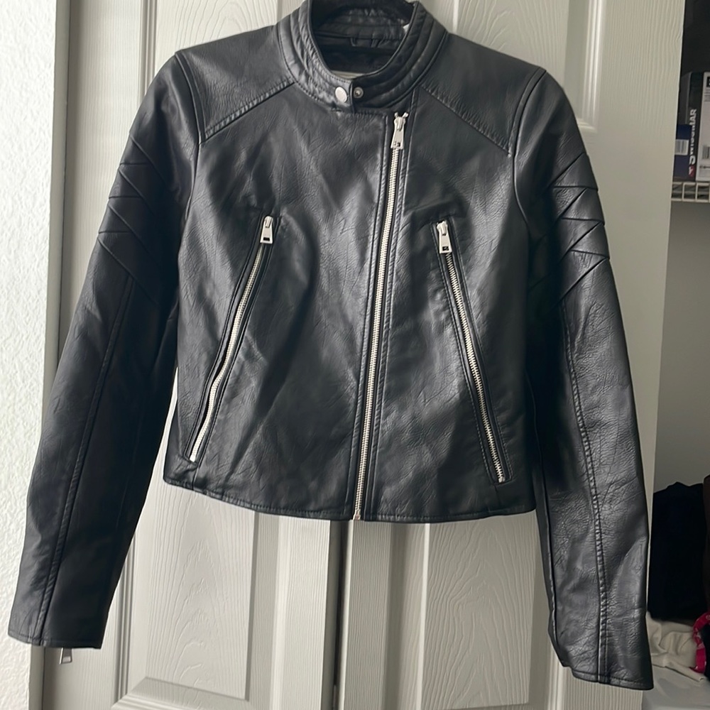 Black Levi’s tight fitted leather jacket size XS. Good condition. $80 OBO